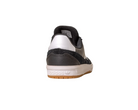 The JI 0846 Black White Gum Tyshawn 2 II Adidas Skateboarding leather suede shoe is shown from the back, highlighting its gum-colored sole and embossed Adidas logo on the heel, isolated on a white background.