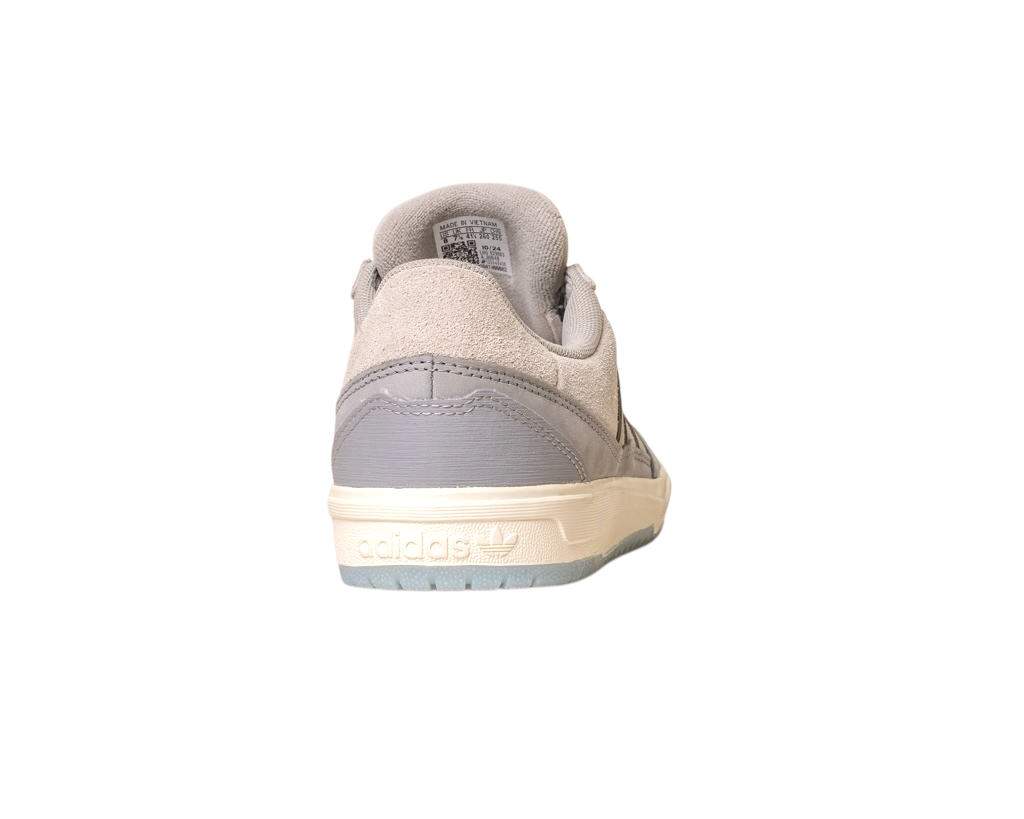 A back view of the JI0848 Granite White Tyshawn 2 II Adidas Skateboarding Shoes, featuring a light gray suede and leather upper, a cream sole with the Adidas logo, and subtle heel texture from the Skateboarding collection.