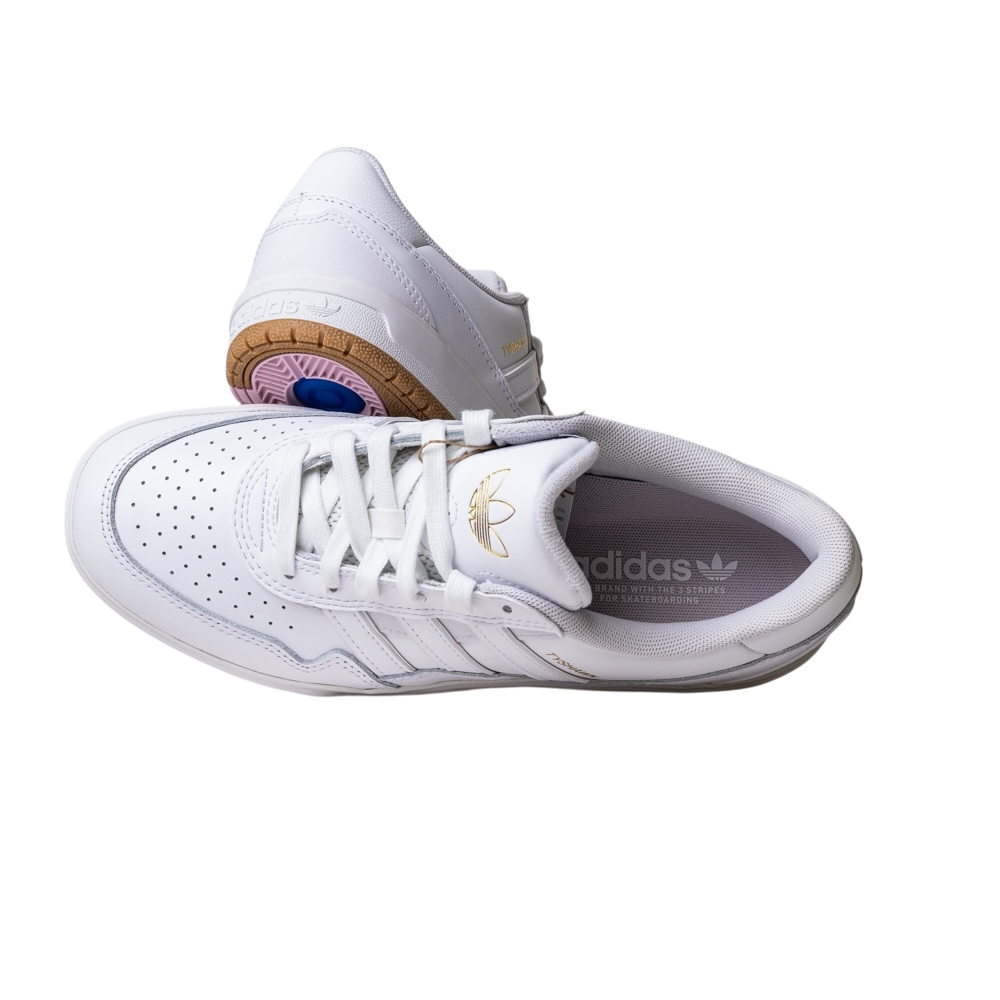 A pair of JQ1130 Cloud White Tyshawn 2 Adidas Leather Skateboarding Shoes, featuring gold accents. One shoe displays the brown and blue circular sole and heel, while the other shows the Adidas logo on the tongue.