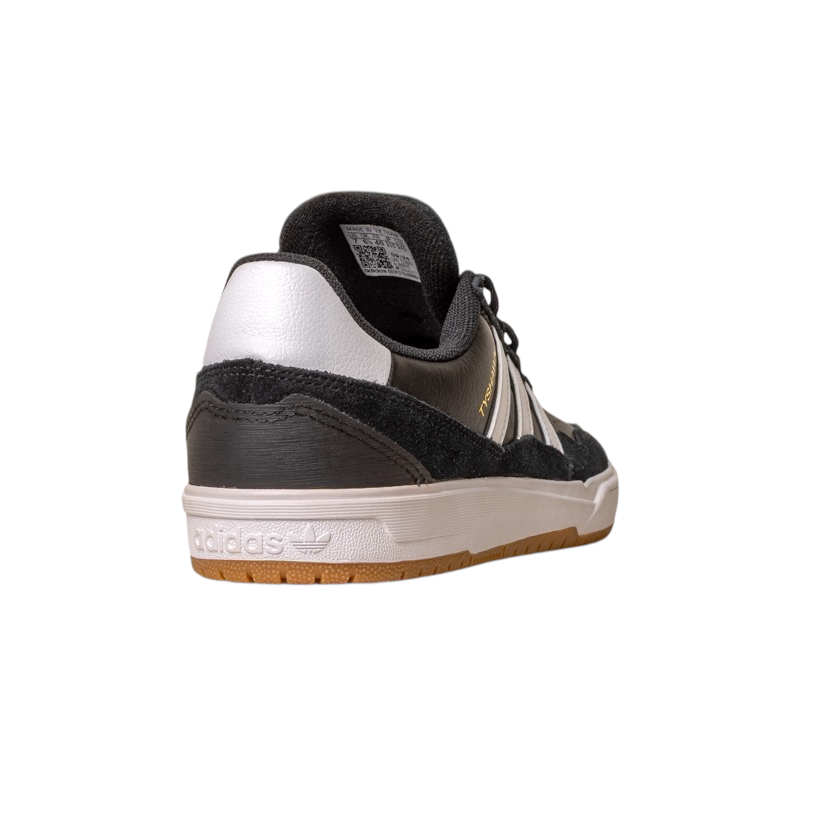 The JI 0846 Black White Gum Tyshawn 2 II Adidas Skateboarding Leather Suede Shoe is shown from a rear side angle on a white background, highlighting the heel Adidas logo and gold branding on the side.
