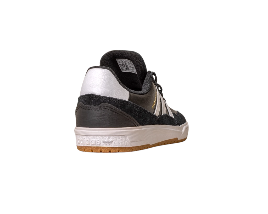 The JI 0846 Black White Gum Tyshawn 2 II Adidas Skateboarding Leather Suede Shoe is shown from a rear side angle on a white background, highlighting the heel Adidas logo and gold branding on the side.