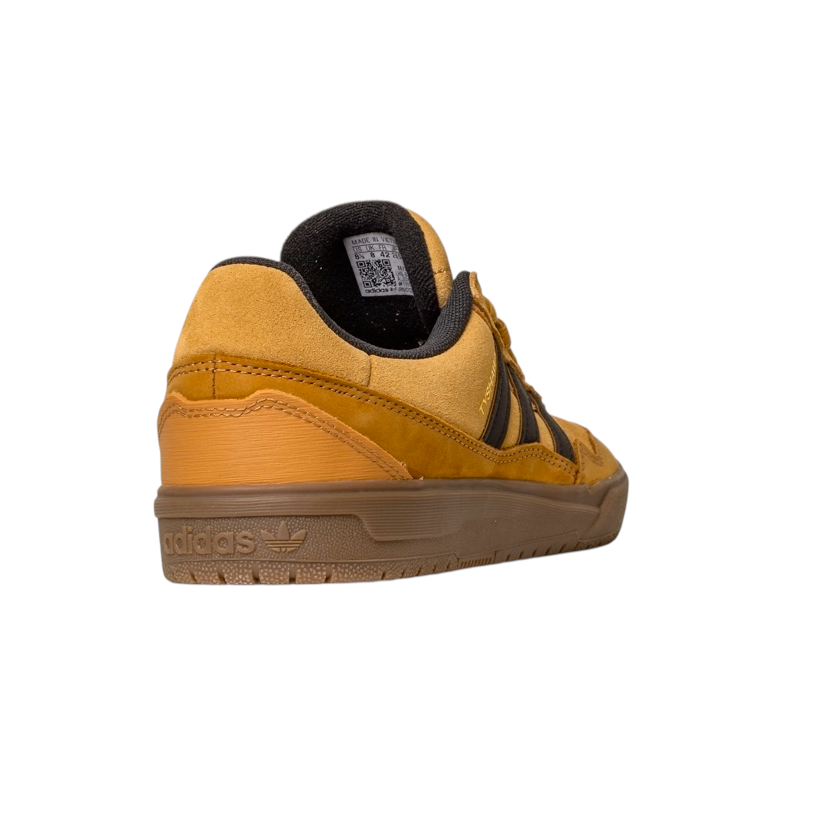 The JI0851 Mesa Black Gum Tyshawn 2 II Adidas Leather Suede Skateboarding Shoe features a mustard yellow upper with black stripes, gum cupsole, and heel Adidas logo, shown from the back left on a white background—perfect for skateboarding fans.