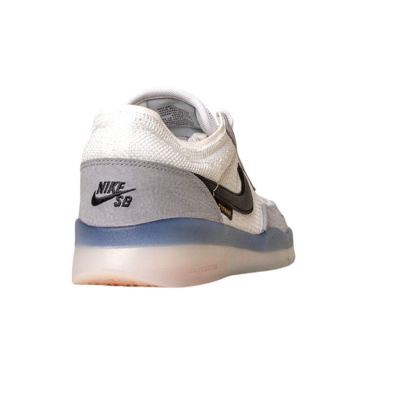 The FV8493-004 Grey White PS8 Nike SB Leather Knit Shoes feature a white and gray design, black swoosh, translucent HART outsole, and NIKE SB heel branding. The shoes are shown from the back and side on a white background.