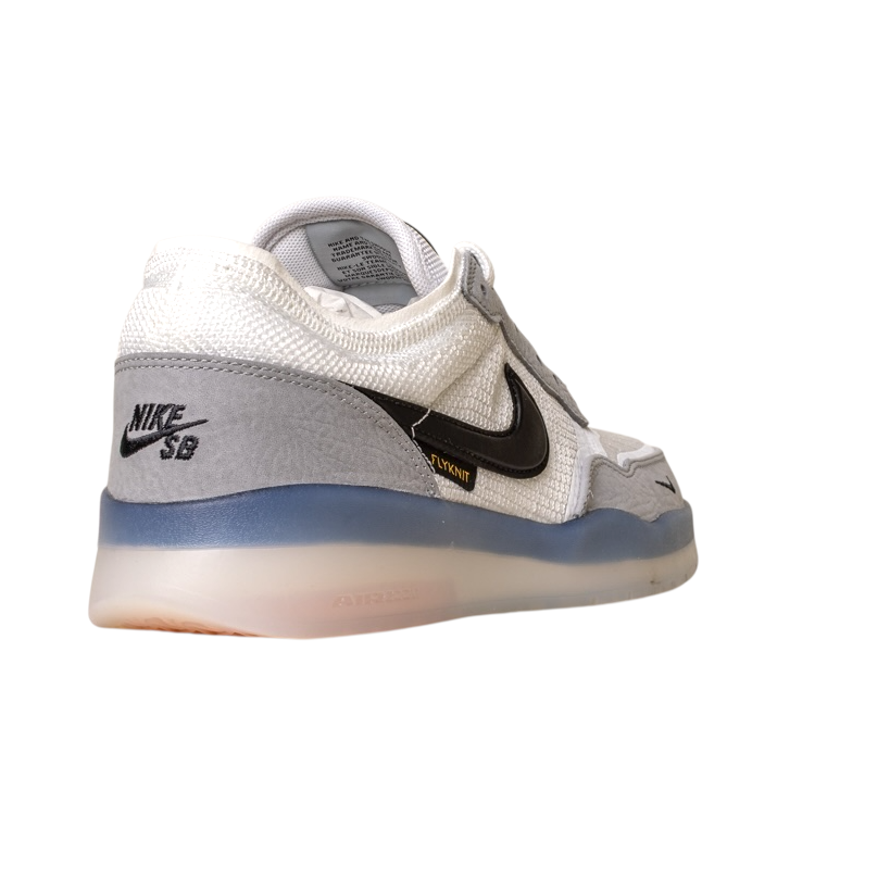 The FV8493004 Grey White PS8 Nike SB Leather Knit Shoes feature a white mesh upper, grey heel, black swoosh, and semi-translucent blue sole, shown from the rear left side against a white background.