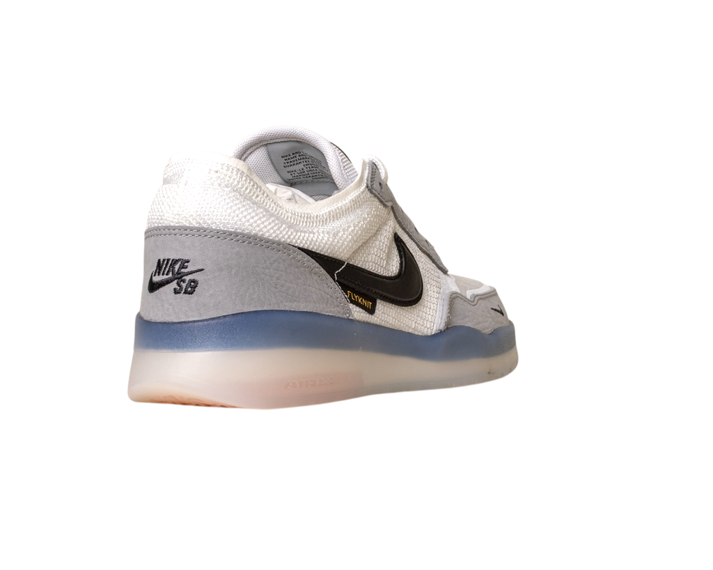 The FV8493004 Grey White PS8 Nike SB Leather Knit Shoes feature a white mesh upper, grey heel, black swoosh, and semi-translucent blue sole, shown from the rear left side against a white background.
