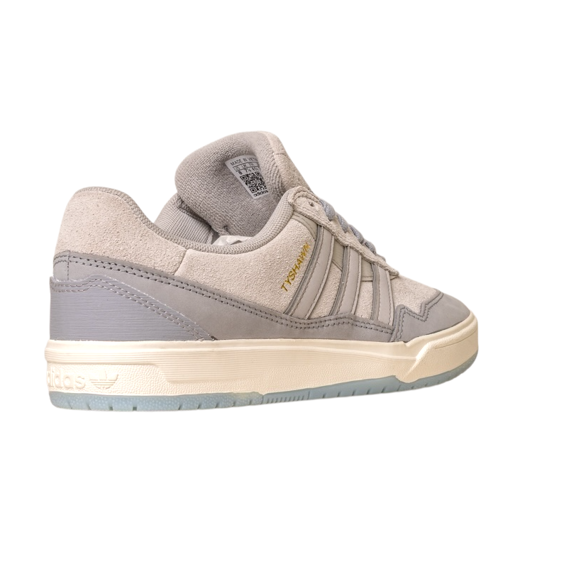 The JI0848 Granite White Tyshawn 2 II Adidas Skateboarding Shoe features leather and suede accents, gold TYSHAWN text, and a cream-colored sole, shown here against a white background.