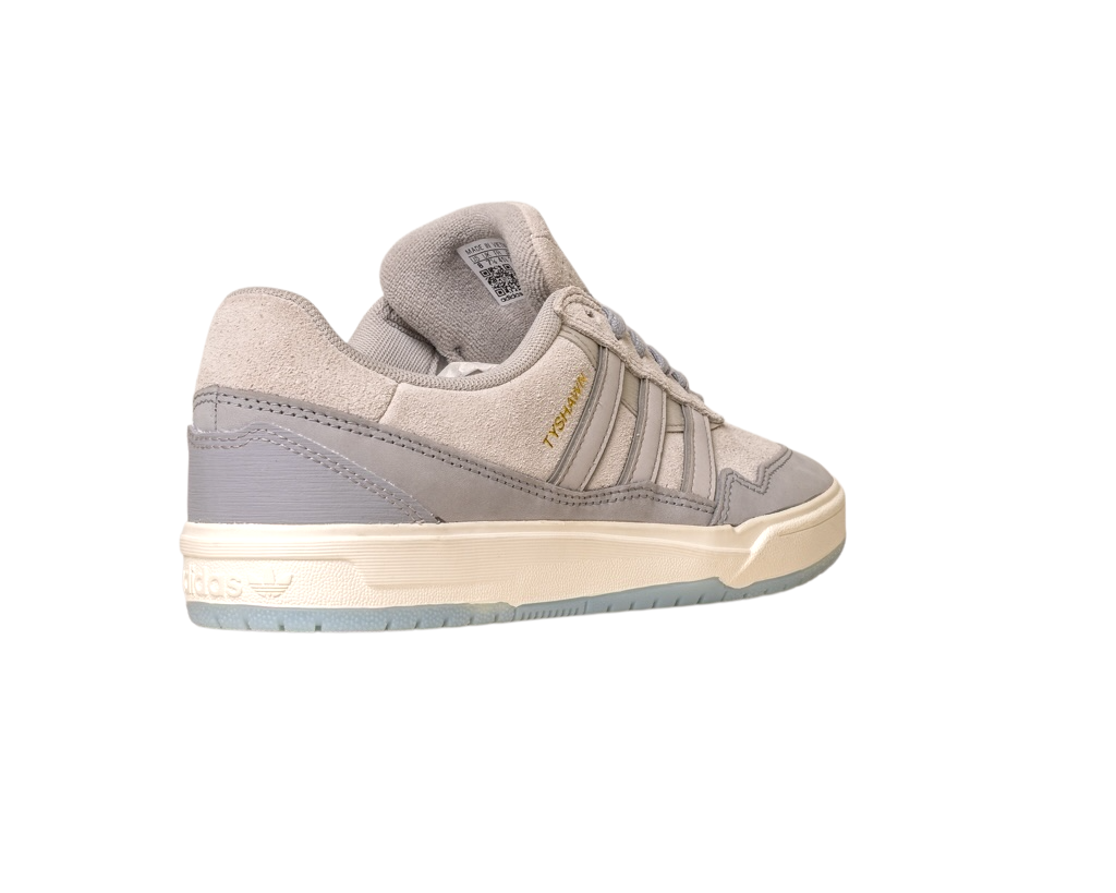 The JI0848 Granite White Tyshawn 2 II Adidas Skateboarding Shoe features leather and suede accents, gold TYSHAWN text, and a cream-colored sole, shown here against a white background.