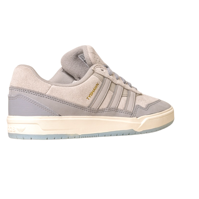 The JI0848 Granite White Tyshawn 2 II Adidas Skateboarding Shoe features light grey suede, grey side stripes, "TYSHAWN" in gold by the laces, and cream and pale blue rubber soles, shown on a white background.