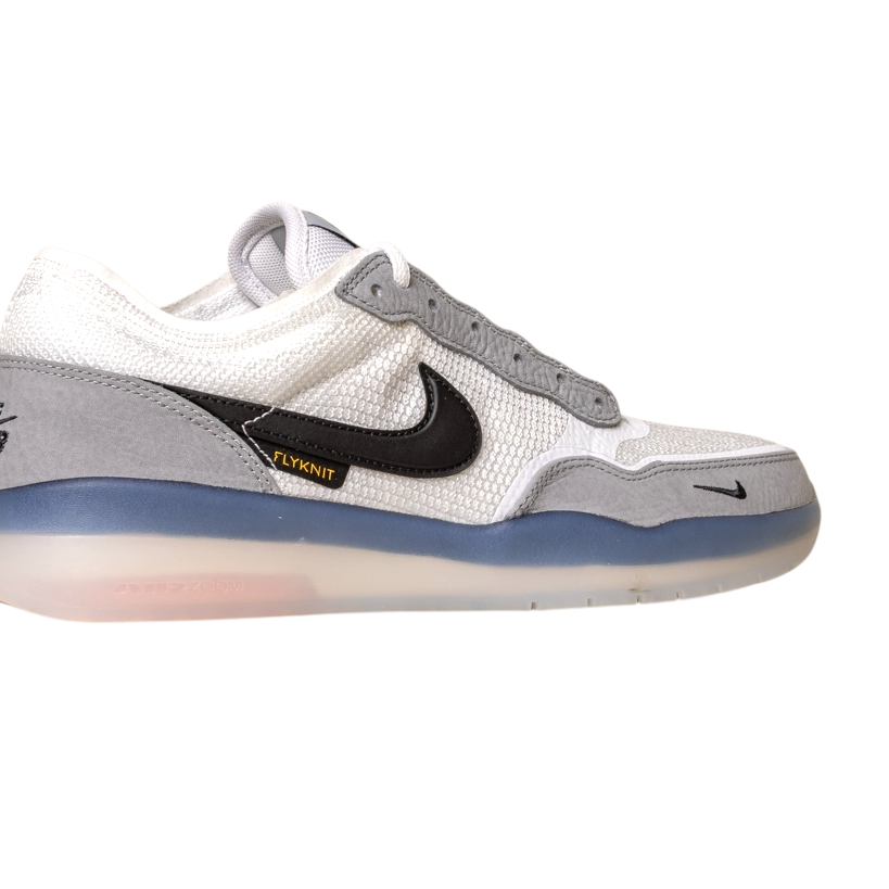 The FV8493004 Grey White PS8 Nike SB Leather Knit Shoes feature a white and gray design with a black swoosh, mesh upper, “FLYKNIT” label, semi-translucent blue-tinted sole, and durable HART outsole, shown against a white background.