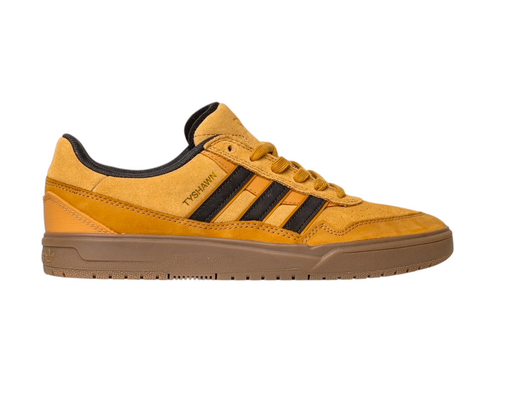 The JI0851 Mesa Black Gum Tyshawn 2 II Adidas skateboarding shoes feature a mustard yellow leather and suede low-top design with black stripes, a brown gum cupsole, and "TYSHAWN" in gold near the laces.