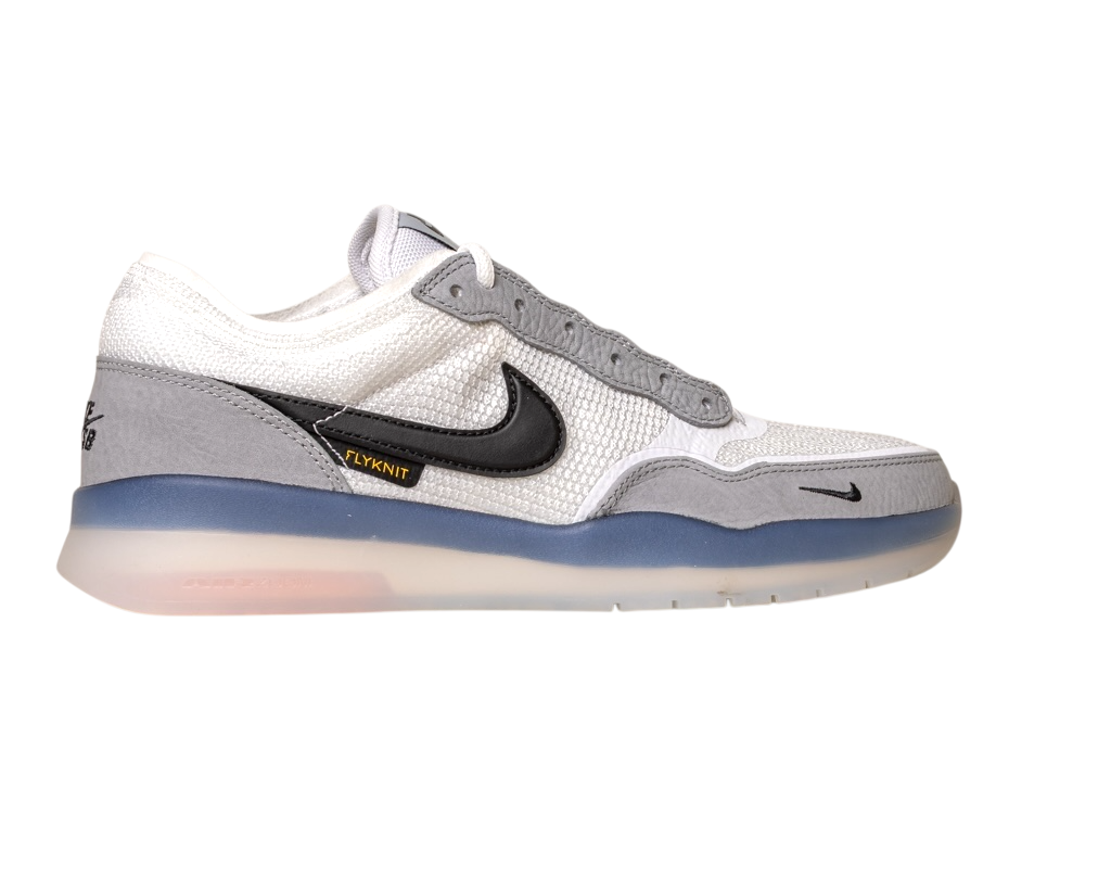 FV8493-004 Grey White PS8 Nike SB Leather Knit Shoes feature a black Swoosh, “Flyknit” label, HART outsole, translucent sole, mesh and suede textures, and a small black Swoosh on the toe.