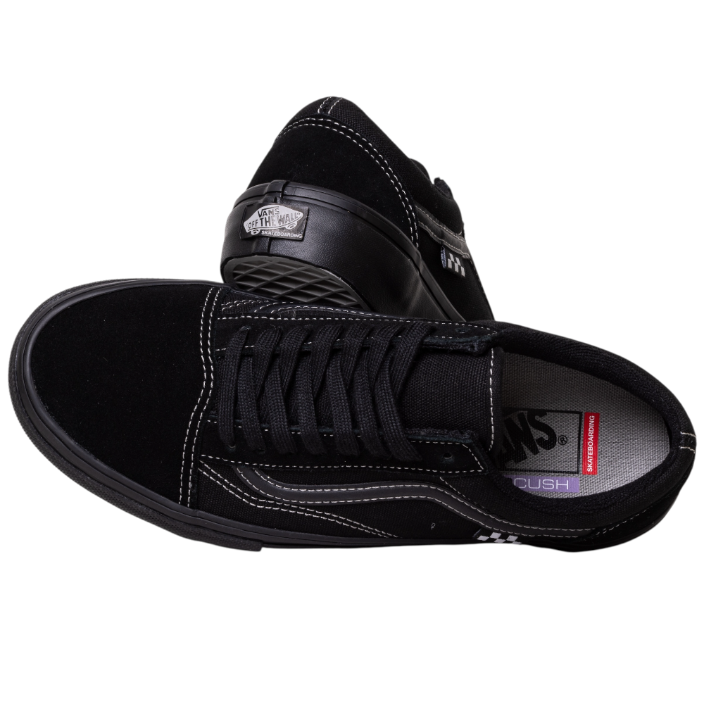 A pair of VN000EJ3174 Black Black Grey Skate Old Skool Vans suede skateboarding shoes, one lying flat and the other showing the waffle sole and Vans logo—a timeless pick for skateboarders.
