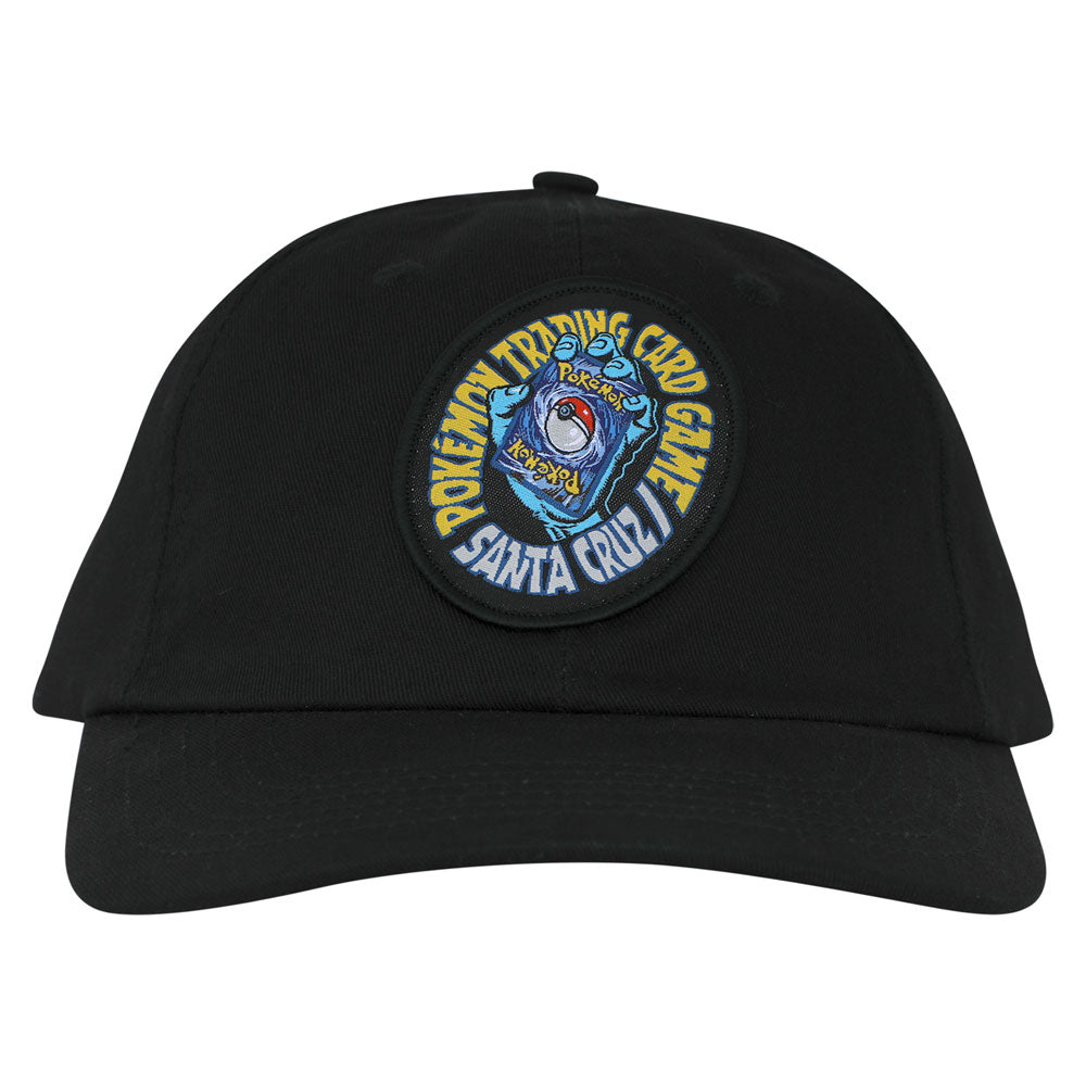 Black Pokemon TCG Hand Snapback Unstructured Hat Black Onew Size Unisex Santa Cruz, an unstructured baseball cap with a circular patch featuring a blue cartoon hand holding a Poké Ball, surrounded by the text Pokémon Trading Card Game Santa Cruz.