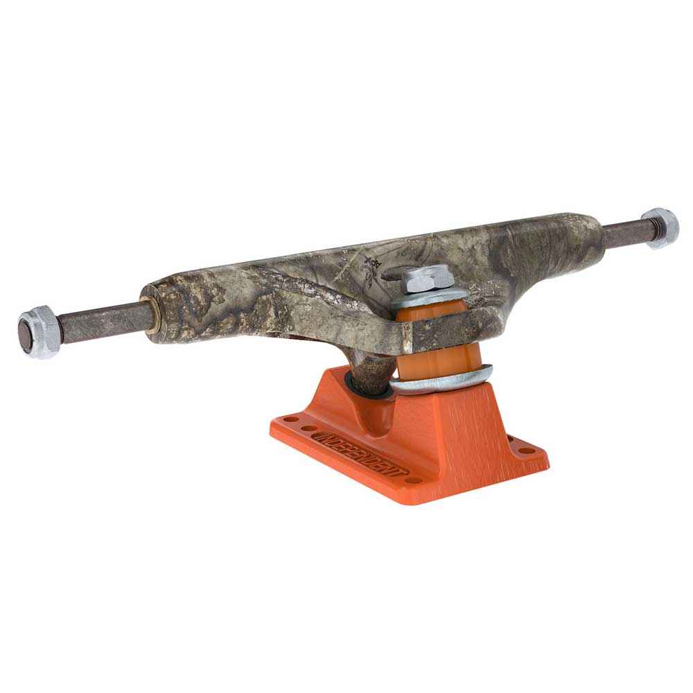A set of Realtree APX INDY 144 Standard Stage 11 Trucks (set of two), featuring a camouflage-patterned hanger and an orange baseplate, is shown isolated on a white background.