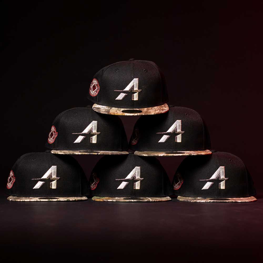 Six Pre-Order Red Dot Red City Connect Houston Astros New Era 5950 Fitted hats are stacked in a pyramid against a dark background, ready for in-store pick-up or pre-order.