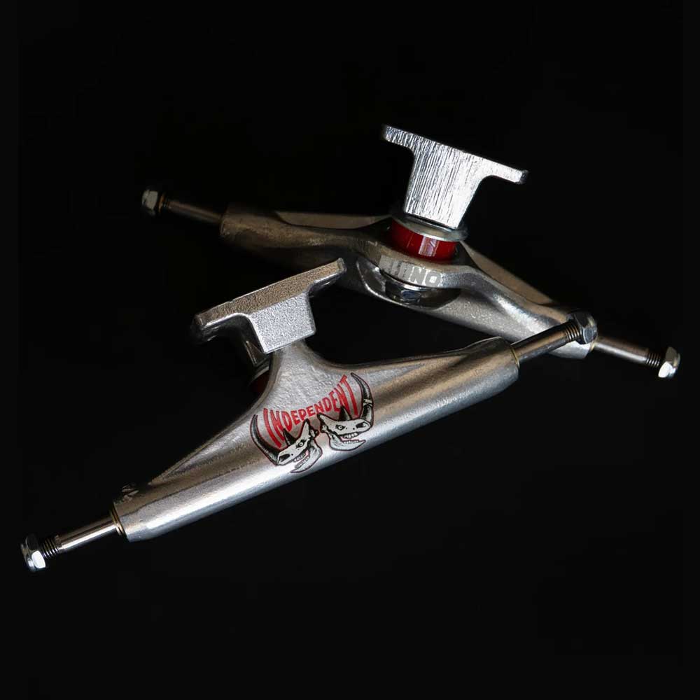 A set of two Rhino Span Polished Silver Standard INDY 169 Stage 11 Trucks are crossed, showcasing the Independent logo on a solid black background.