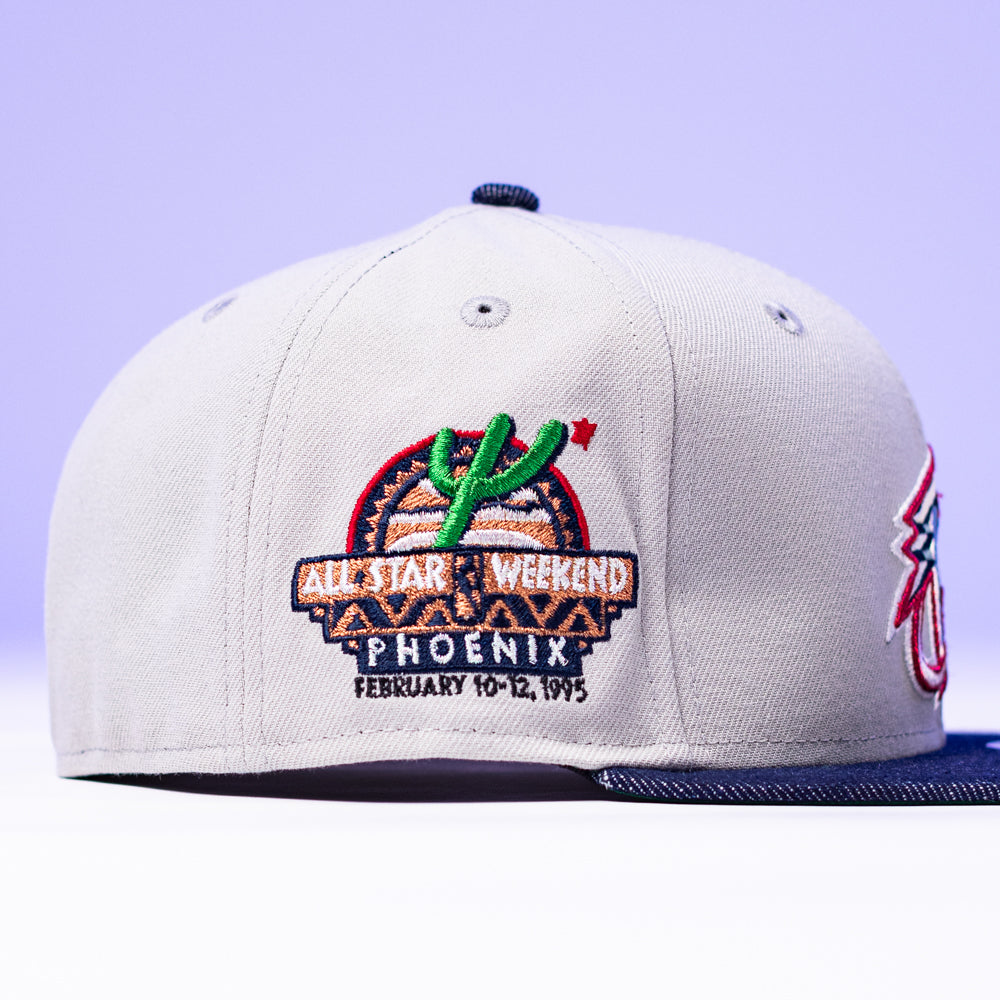 The Unit 95 ASG Denim Houston Rockets New Era Hat 5950 Fitted features a vibrant embroidered cactus and basketball patch for the 1995 NBA All-Star Weekend in Phoenix—perfect for Rockets fans.