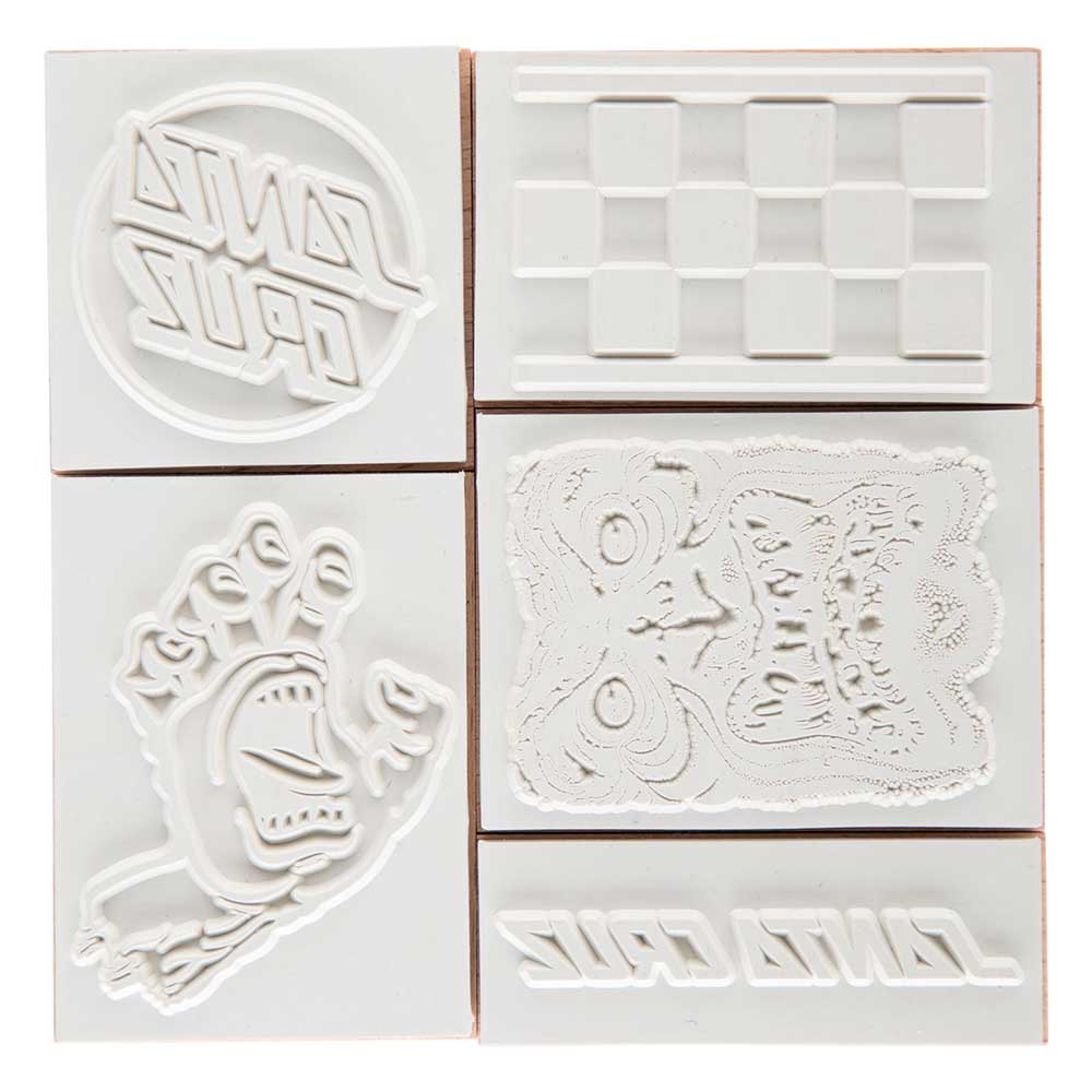 The SC Stamp Set Natural OS Unisex by Santa Cruz includes five white rubber stamps on a wooden block with unique designs, perfect for fans of skateboarding apparel and Santa Cruz Skateboards.