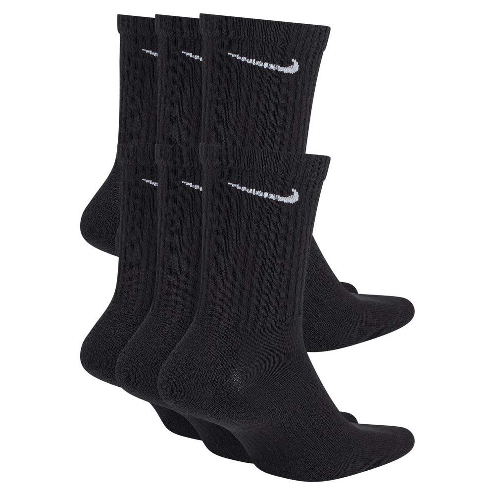 Six pairs of black and white Nike SB Crew Socks (style SX7666010) are displayed side by side, each with a white Nike Swoosh logo near the top.
