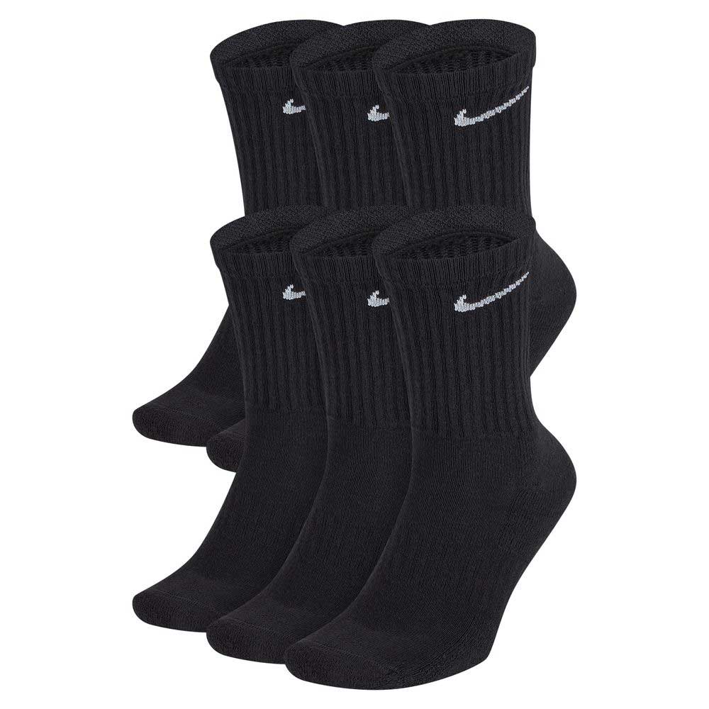 Six pairs of SX7666010 Black White Nike SB Crew Socks with ribbed cuffs and white swoosh logo. These black socks feature Dri-FIT technology and are displayed upright in two rows, side by side.