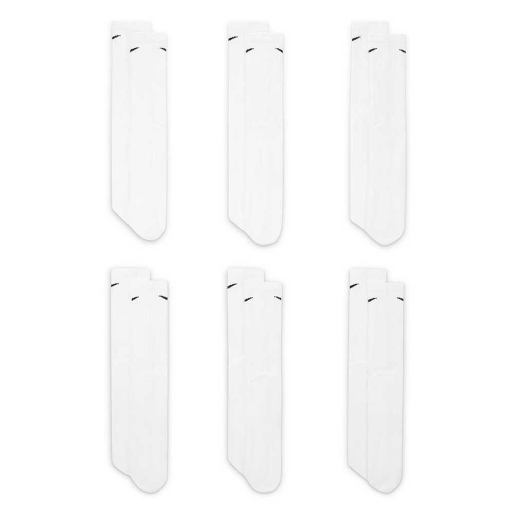 Six pairs of Nike SB SX7666100 white crew socks with a black logo, arranged in two rows on a white background. This 6-pack offers cushioned comfort for everyday training and wear.