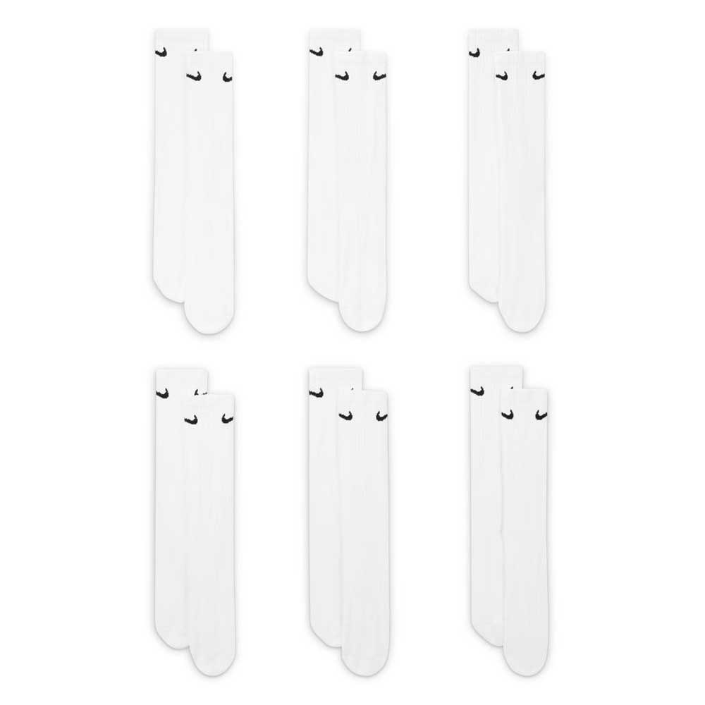 Six pairs of SX7666100 White Black Nike SB Crew Socks are displayed in two rows of three, each featuring a black Nike swoosh and Dri-FIT technology for comfort and dryness.