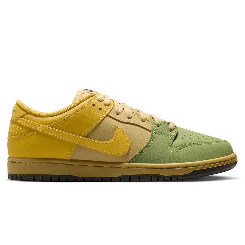 The Saffron Quartz Pear Hatch Chili Dunk Low Pro IO0427300 Nike SB Skateboarding Shoes feature a leather upper with a yellow heel, tan midsection, green toe box, black sole, and yellow Swoosh, displayed in profile facing right on a white background.
