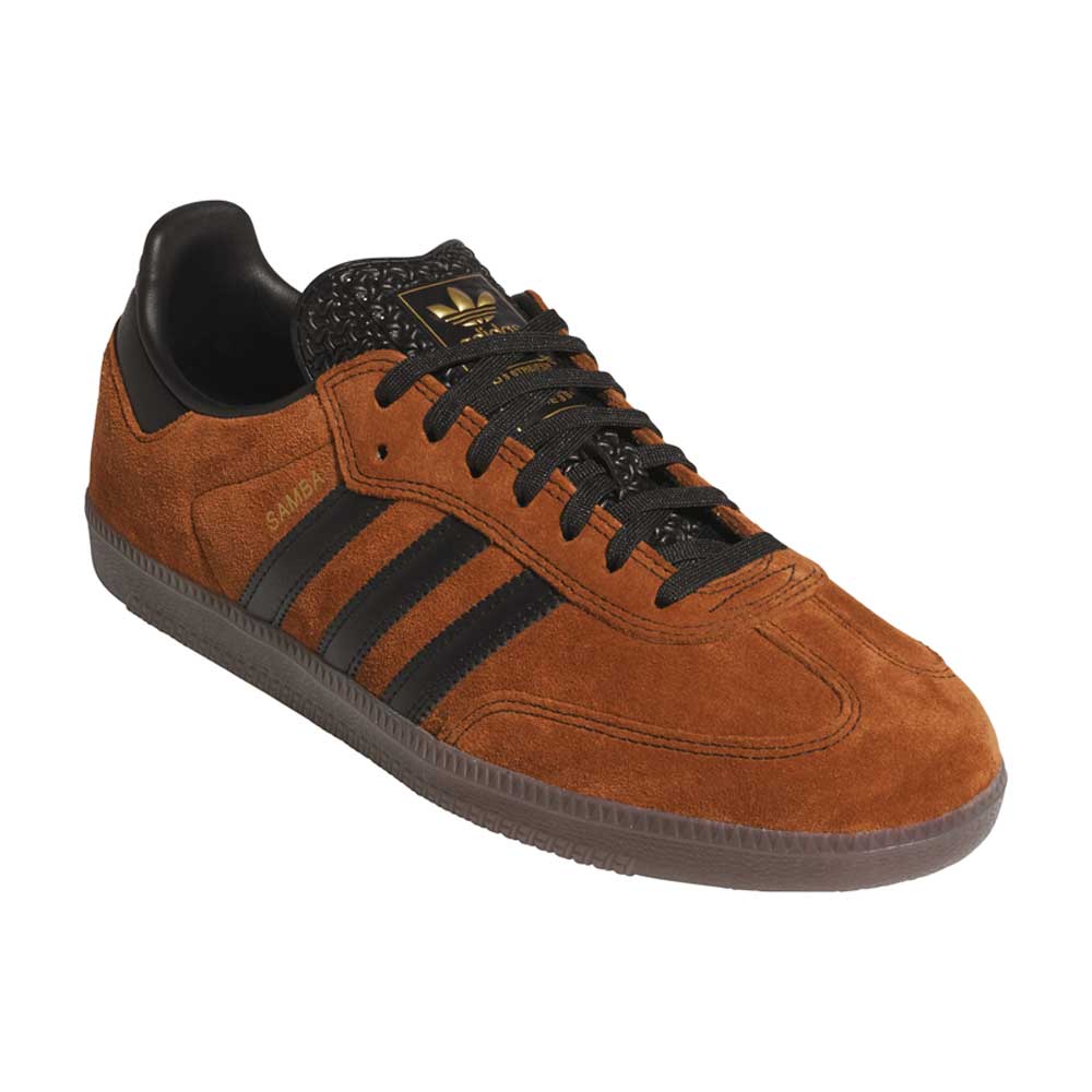 The Samba ADV Brown Black HQ9286 Adidas Skateboarding Leather Suede Shoes feature brown suede uppers, black stripes, laces, and tongue with a gold Adidas logo, plus a translucent gray sole for a stylish update to the classic look.