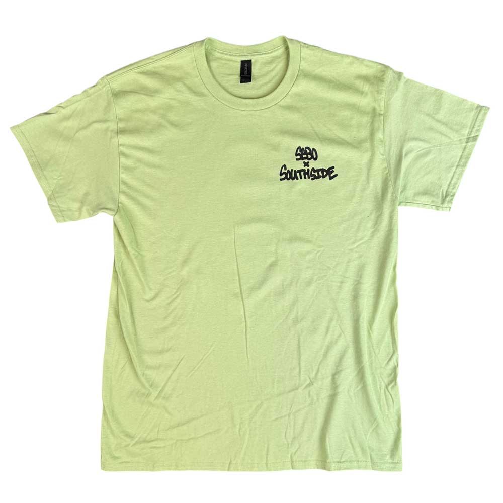 The Sebo Walker x Southside Skatepark Avocado Tee is a light green short-sleeve t-shirt with “850 The Southside” in black on the left chest, inspired by Southside Skatepark. Laid flat on a white background.