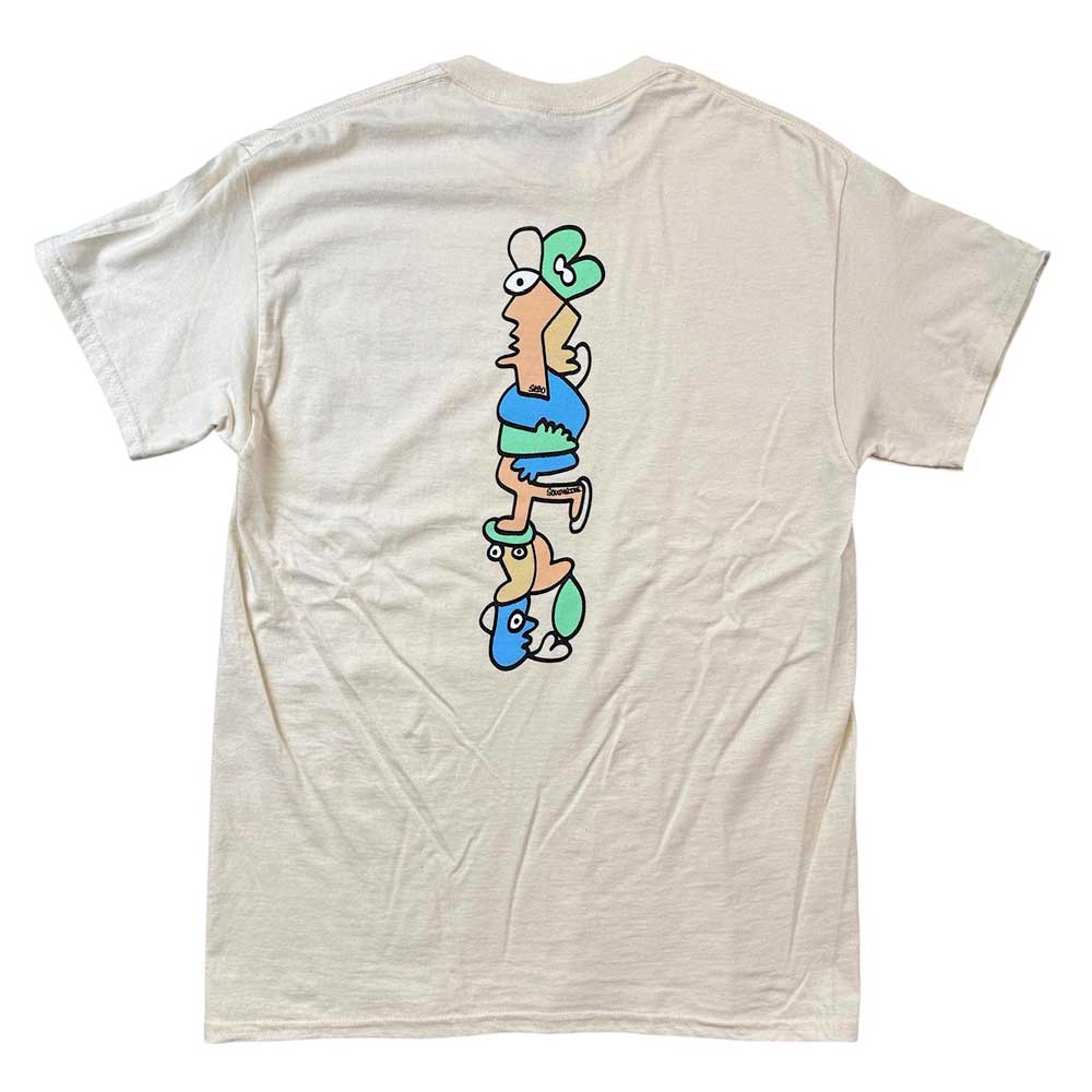 The Sebo Walker x Southside Skatepark Oat Tee is a white shirt featuring a back graphic of two abstract cartoon figures—one upright, one upside down—in green and blue outfits, created in collaboration with Southside Skatepark.