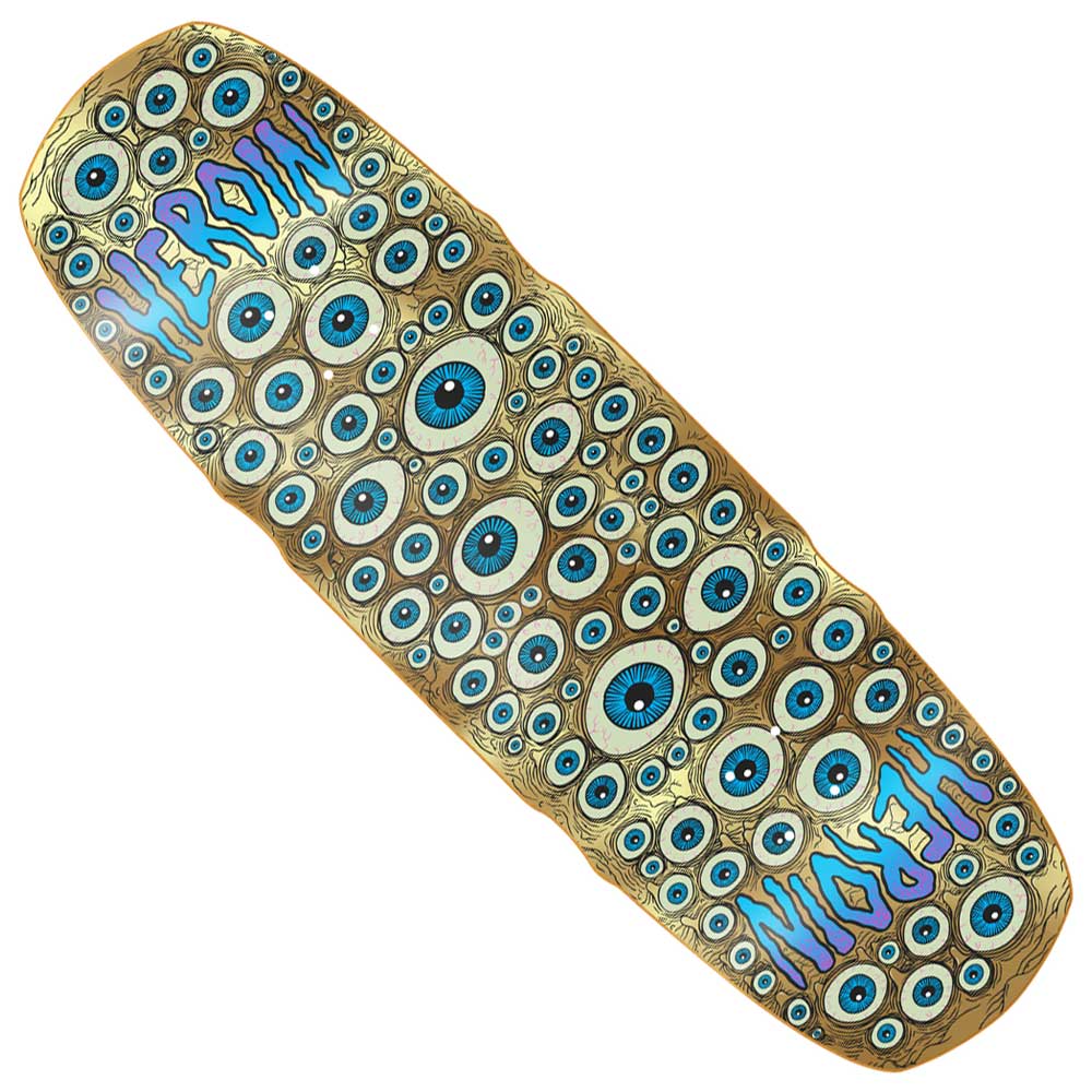 The Seeing Double Mutated Gold 9.5 deck from Heroin Skateboards is shaped from durable 7-ply hard rock maple and features blue and white cartoon eyes with black pupils, plus "HEROIN" in bold blue on both ends; available in various stains.