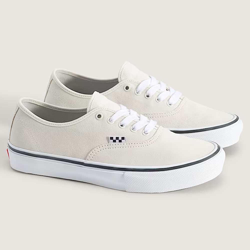 The Skate Authentic White Gunmetal Vans VNOA5FC8XQL Suede White Skateboarding Shoes feature an off-white canvas upper, white laces, rubber soles, and a black-and-white checkerboard design near the eyelets for added style and grip.