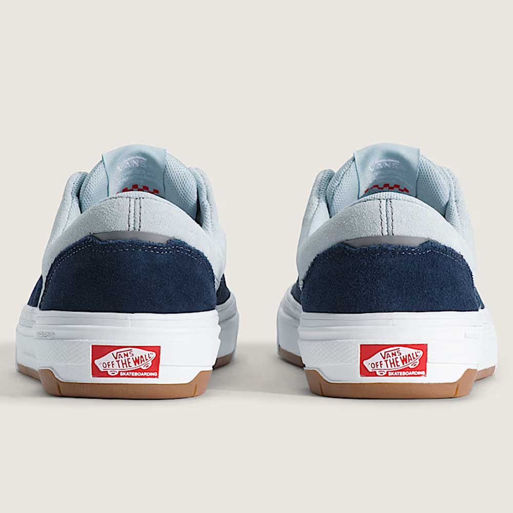 The Skate Era Wafflecup Navy Blue Bell VN000EF0J4I1 Vans Suede Rubber Shoes are shown from the back in light blue and navy with white rubber heels displaying the Vans Off The Wall logo on a neutral background.