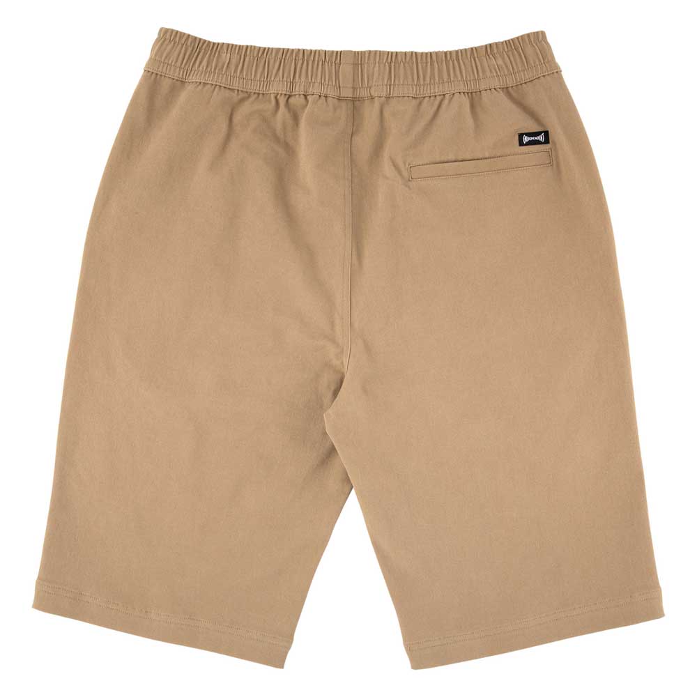 Span Elastic Waist Shorts Khaki Bottom Mens Independent seen from the back, feature a baggy long inseam, elastic waistband, and a right-side back pocket with a small black Independent branding tag above it.