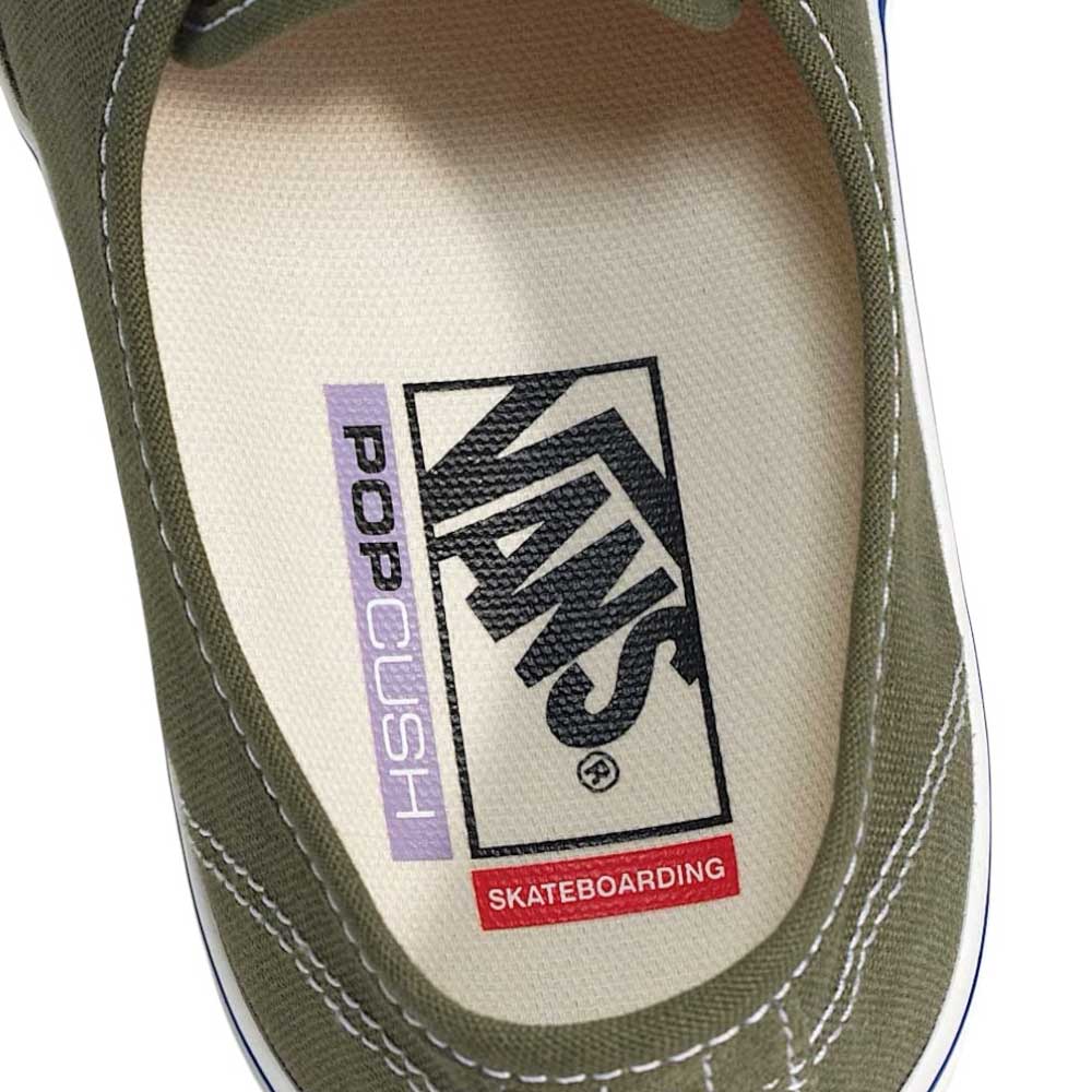 Close-up of the Suede Canvas Mossy Olive Authentic VN0A5FC8FR11 Vans Skate shoe, highlighting the insole with "Vans" in black, "POP CUSH" in purple/black, and "SKATEBOARDING" in red inside its mossy olive upper.