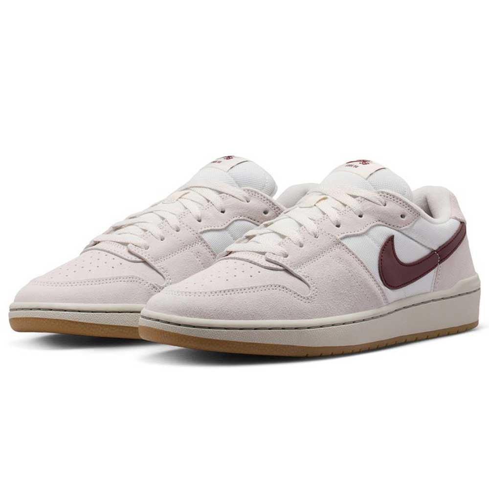 Summit White Mystic Dates Code 58 IB0108102 Nike SB Skateboarding suede sneaker in off-white with a dark red swoosh and a gum rubber sole.