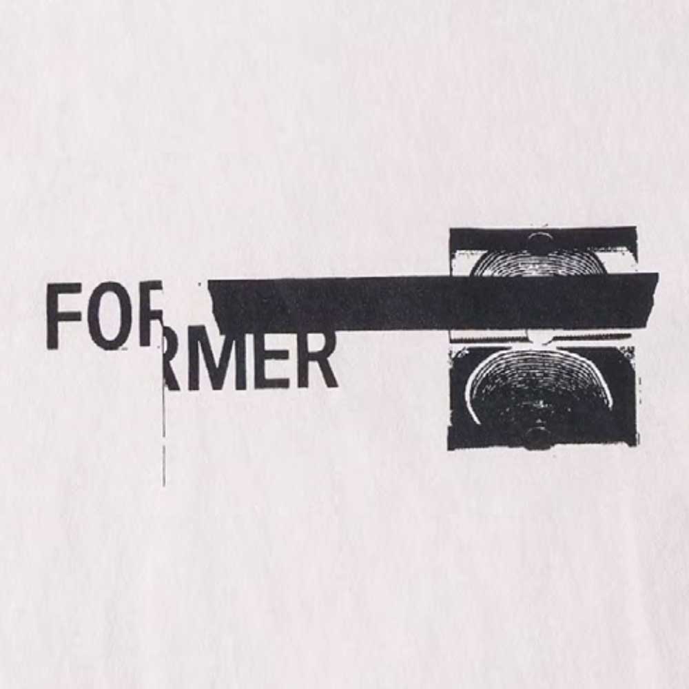 The Tape Crux Former Tee Bone features bold black FORMER text, partially concealed by a horizontal black bar and a stamped fingerprint against a crisp white backdrop. The bar artfully covers the O and part of the R, giving this premium jersey cotton vintage T-shirt an edgy, standout screen print design.