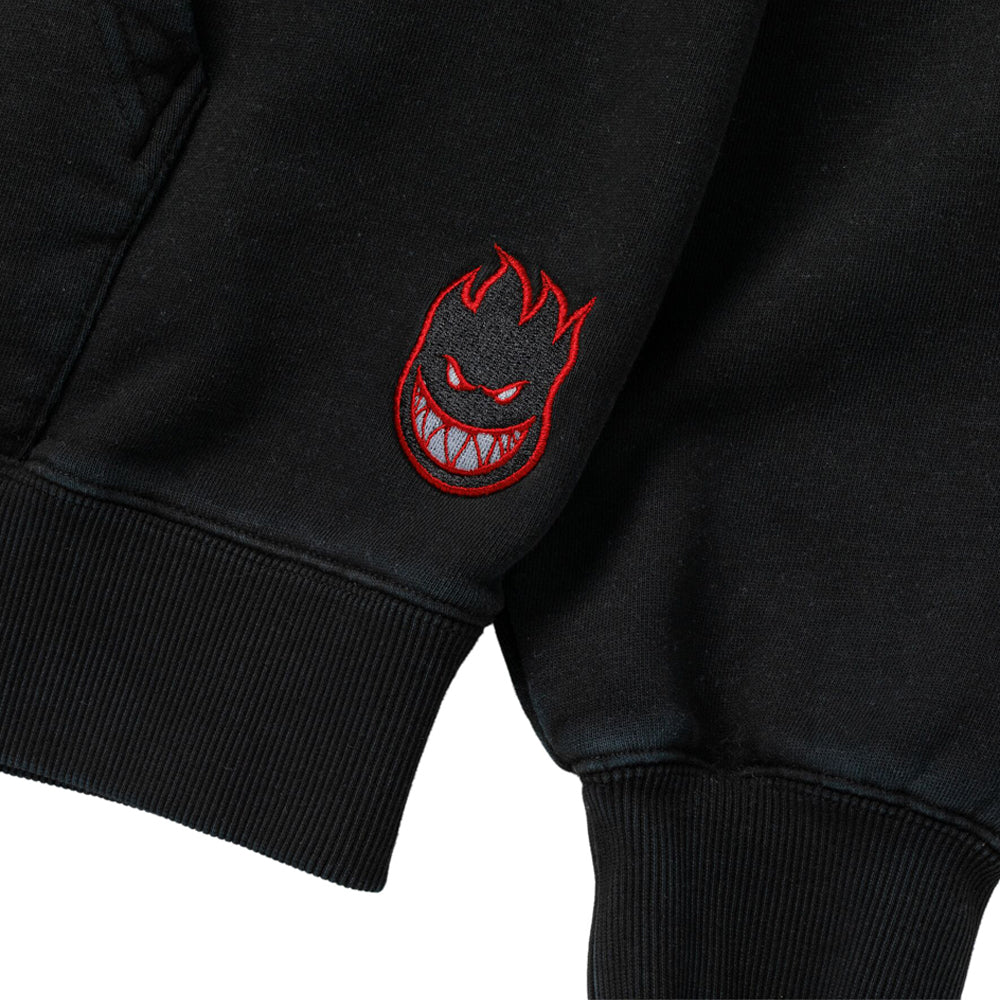 Team Lil Big Head Black Vintage Wash Pullover Hoodie Spitfire Wheels in a black vintage wash, featuring an embroidered red and white flame-headed character logo on the sleeve cuff.