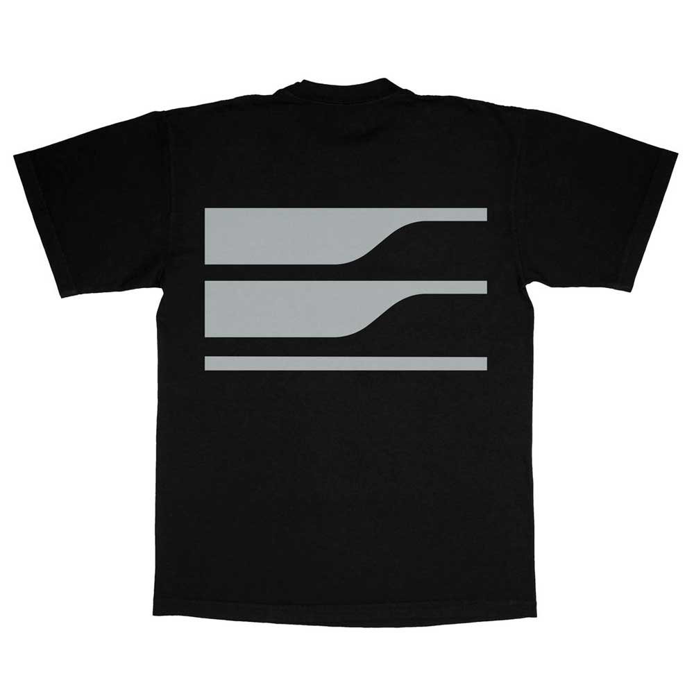 The Tech Script Tee Black EDGLRD is a black heavyweight cotton shirt with two thick, horizontal gray lines featuring wavy right-side indentations on the back for a minimalist, abstract look. Made in the USA.