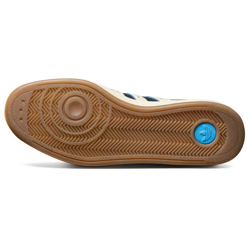 The image shows the gum sole of Thrasher Magazine Glenburn Black Blue KH7384 Adidas Skateboarding Shoes, featuring a herringbone tread, circular toe designs, a blue logo by the heel, and part of a white leather upper.
