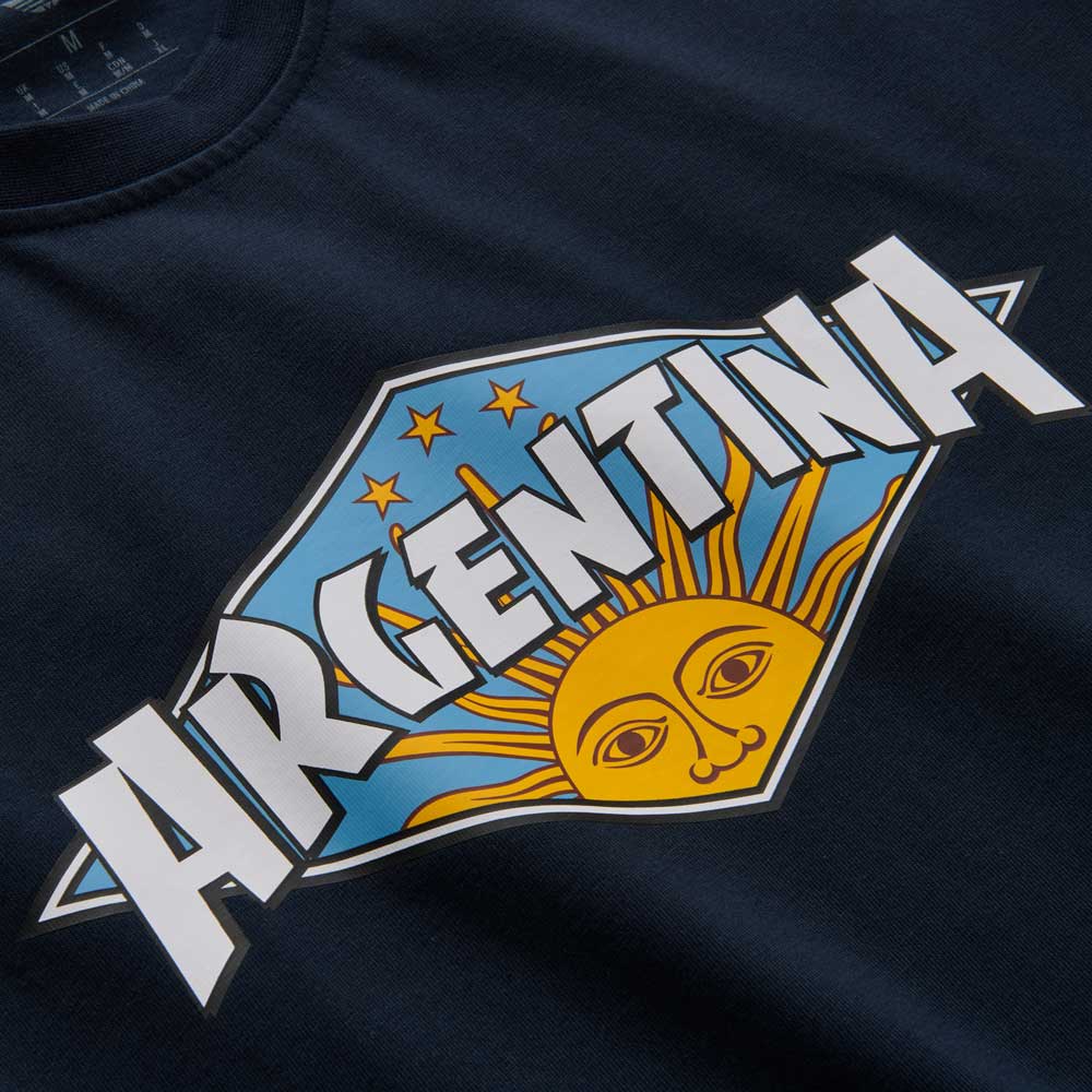 Show your Argentina football pride with the Thrasher Magazine x Adidas AFA Tee Navy KX4543—a navy skateboarding t-shirt featuring bold "Argentina" lettering, a stylized sun, and stars by Adidas Skateboarding.