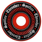 The Thrasher Oath SF Red 58mm99A Radial Full San Francisco Spitfire Wheel features a bold black and red spiral design, white gothic Spitfire and Thrasher Oath lettering, a red inner circle, and a black center.