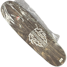 The Tommy Guererro Silver Black Real Skateboards Deck 9x31.4 Circa 2017 Signed Collectible features a natural wood finish with a white flame graphic and stylized text, and comes wrapped in plastic packaging.