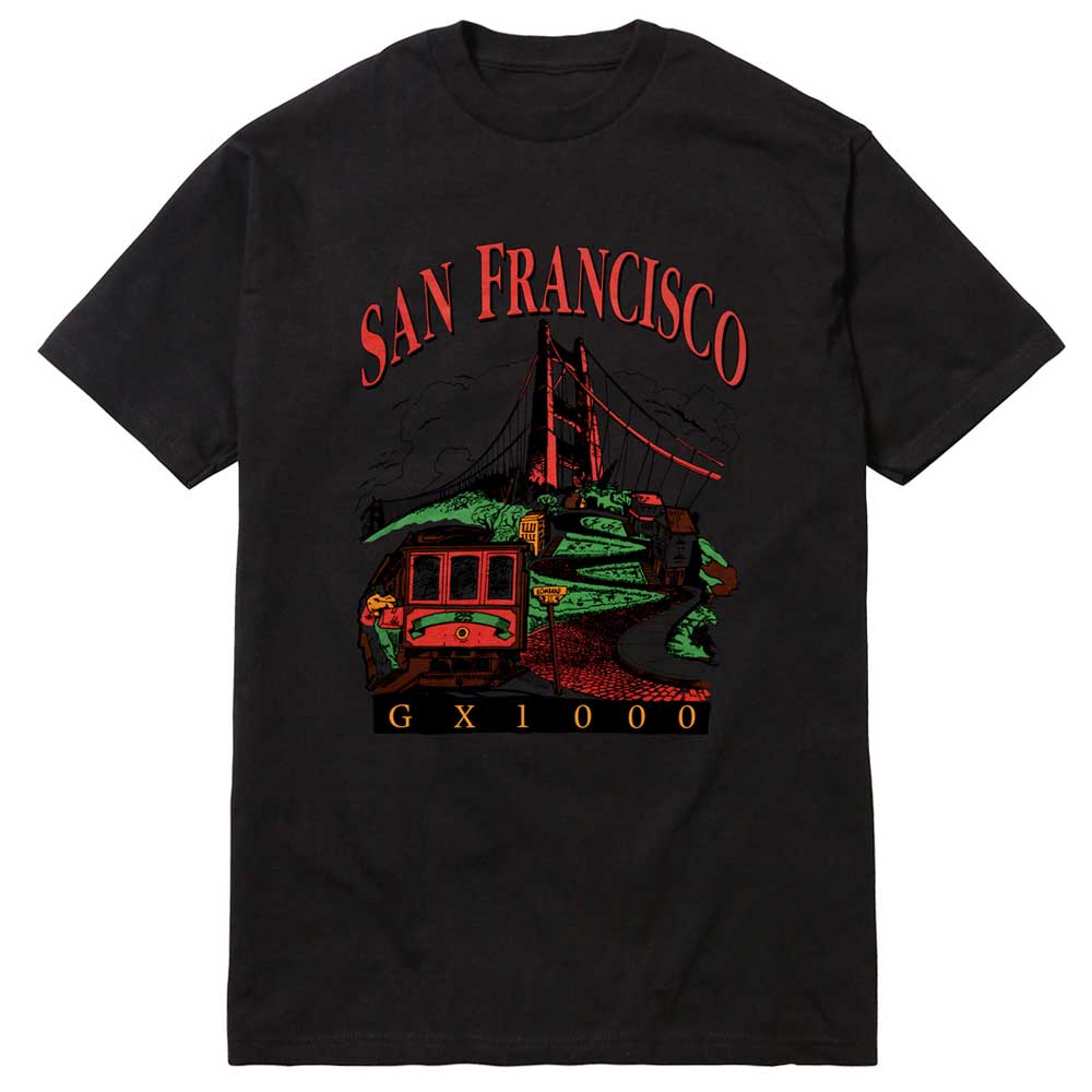 The Tourist GX1000 Tee Black showcases a bold graphic of the Golden Gate Bridge and a classic red cable car, with “San Francisco” displayed above—making it an ideal souvenir for anyone wanting to celebrate the city’s essence. Vibrant red, green, and yellow tones make this tee pop, while striking GX1000 text in bright yellow anchors the design at the hem.