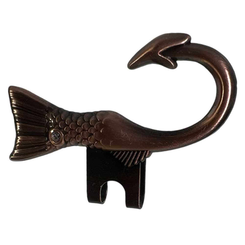 The Two Tone Metallic Hook Antique Bronze Blip by Whatafitted features a curled fish or mermaid tail shape with scale details and a fin, finished in antique bronze and mounted on a black base.