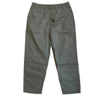 The VN00000D1LE Range Baggy Tapered Taupe Pant from Vans Skateboarding features a loose fit, elastic waistband, and side pockets—an ideal pant for comfort and style, shown laid flat on a white background.