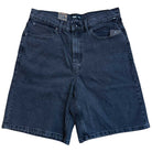 The VN000C9VEMQ1 Skate Check 5 Loose Shorts in washed black denim by Vans feature a heavyweight fabric, front and back pockets, a zip fly, and belt loops, shown laid flat on a white background.