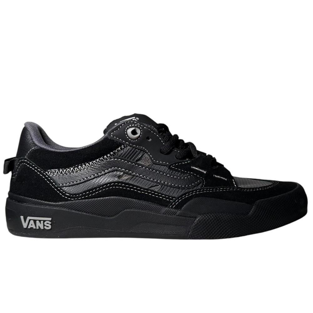 The VN000D5D1741 Wayvee Skate 2 Black Black Grey Vans Suede Shoes feature a black suede upper, white stitching, wavy side stripe, black laces, textured sole, impact cushioning, and Vans logo—ideal for skateboarding with a sleek look.