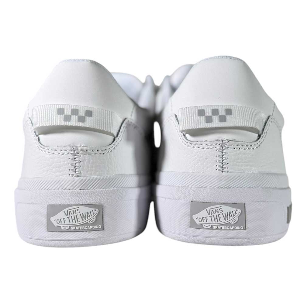 A close-up of the back of two VN000D5DWHT White Skate Wayvee Vans Leather Shoes, featuring the "Vans Off The Wall" logo on the heel and a checkered pattern on the heel tab.