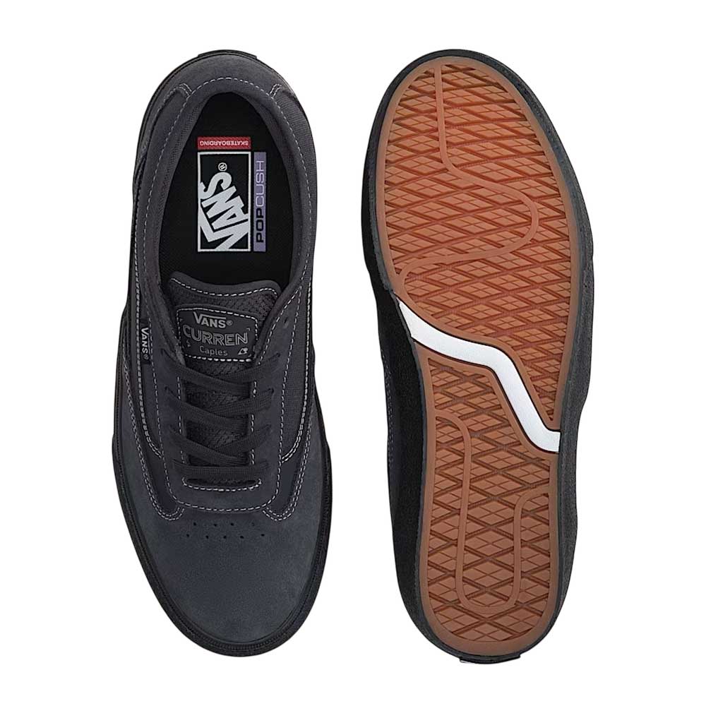 Top and bottom view of VN000D85CC81 Skate Curren Caples Charcoal Black Vans suede skate shoes with white stitching, gum rubber waffle sole, Duracap underlays, and Vans Curren branding on the tongue.